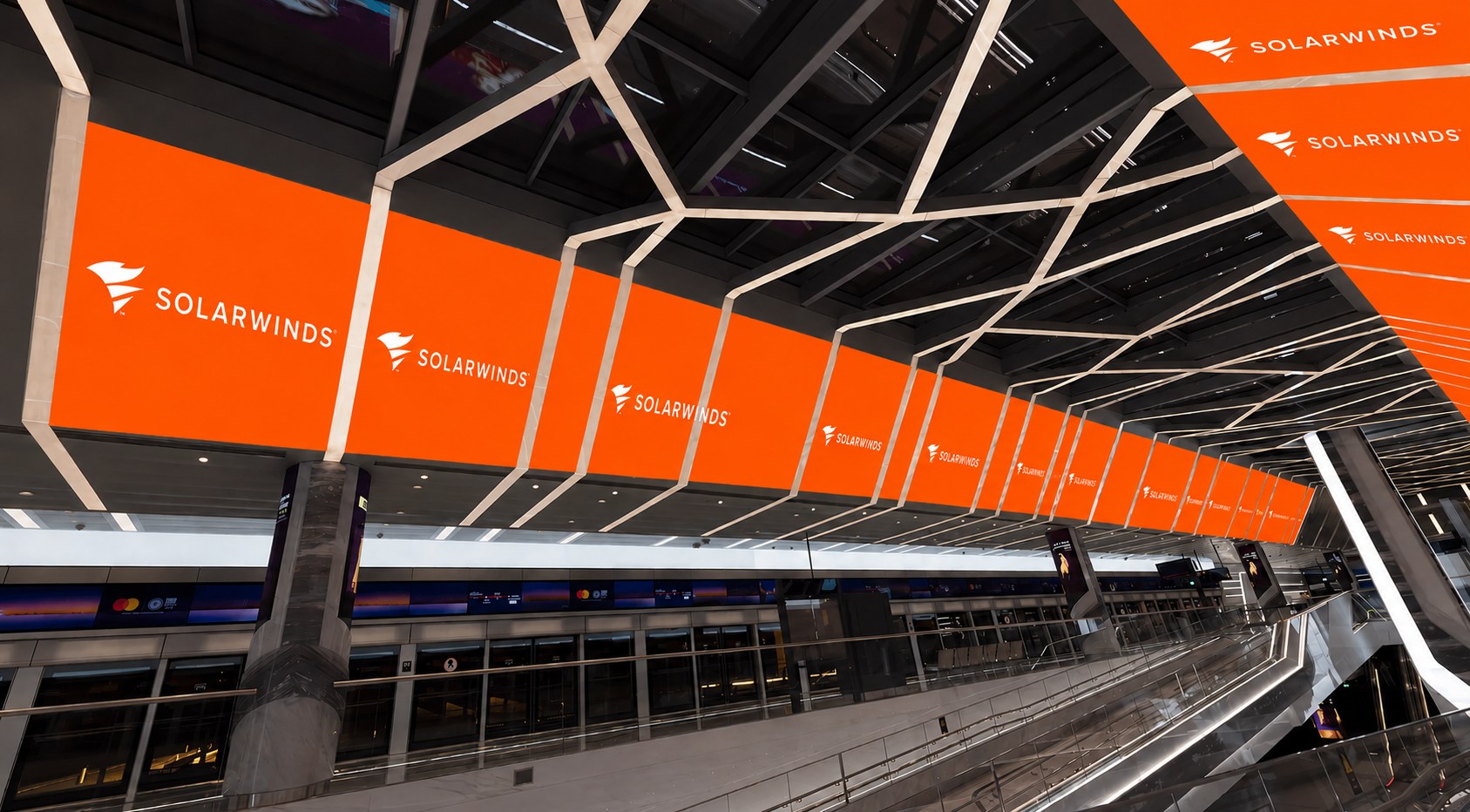 SolarWinds overhead banner run along the Expo City metro station concourse